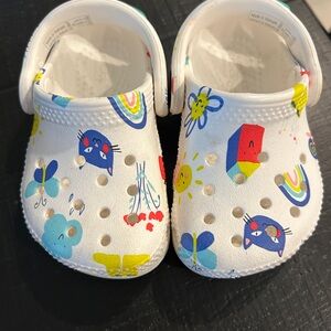 CROCS Kids White Clogs with Multicolor Cartoon Prints